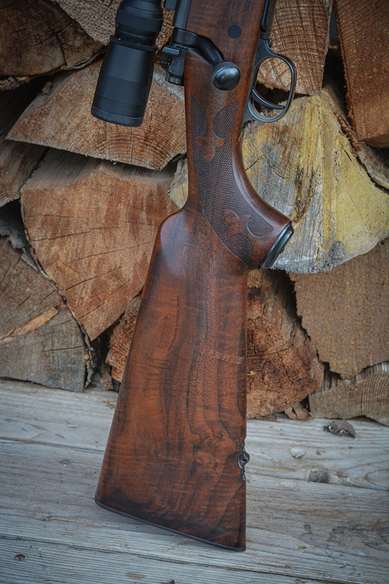 The Winchester JOC tribute rifle features a classic style high-grade walnut stock.